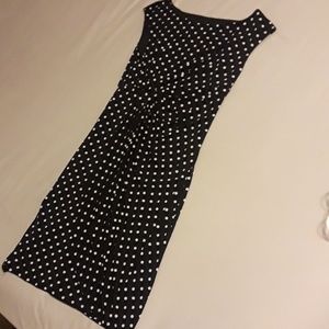 Polka dot, sleeveless and draped dress